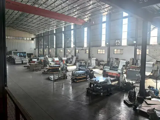 Yueyang Technology coating plant in Bazhou, Hebei — steel coils ready for the writing-surface line